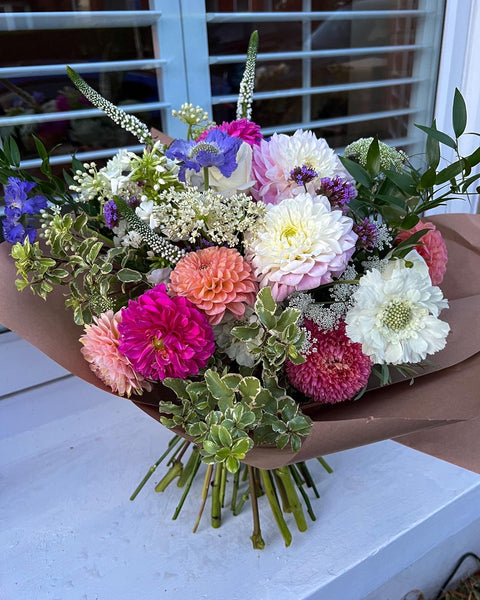 Large hand-tied bouquet.